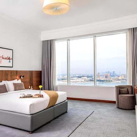Somerset West Bay Доха Экстерьер фото A bedroom at the hotel