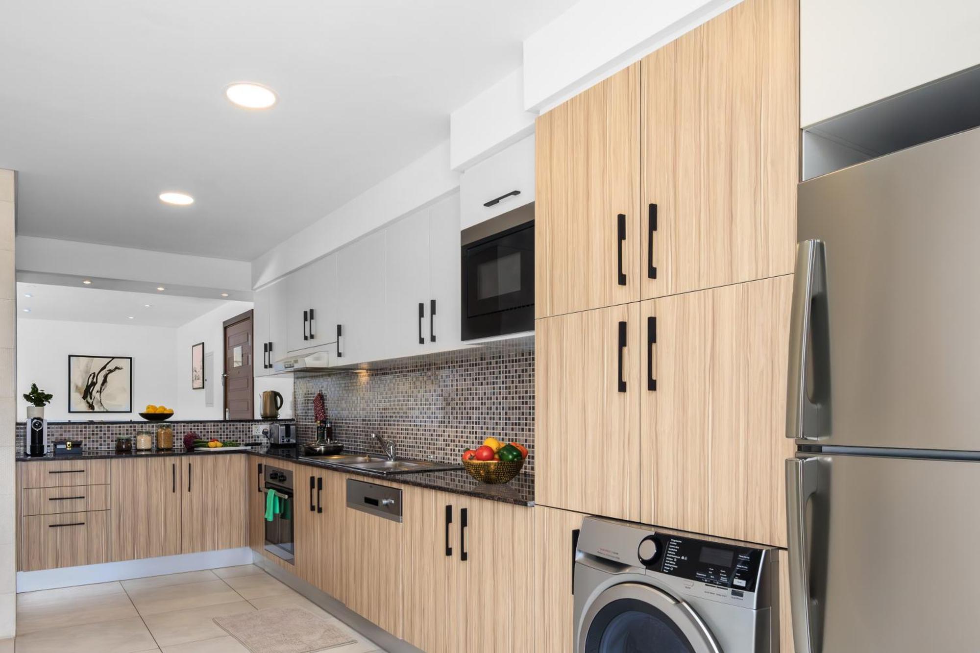 Somerset West Bay Доха Экстерьер фото A kitchen at The Standard East Village